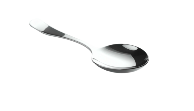 Shiny spoon lying at an angle on a dark surface