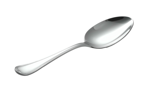 Shiny silver spoon lying diagonally on a stark black background