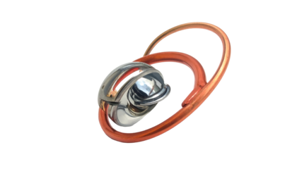 Abstract metal puzzle with intertwined copper and silver elements