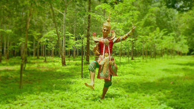 
Southern Thai Nora dancers showcase elegant poses under the soft light filtering through the rubber plantation, blending nature&rsquo;s serenity with the rhythm and beauty of traditional performing arts.