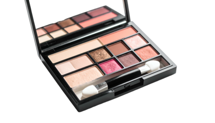 Open eyeshadow palette with various colors, mirror