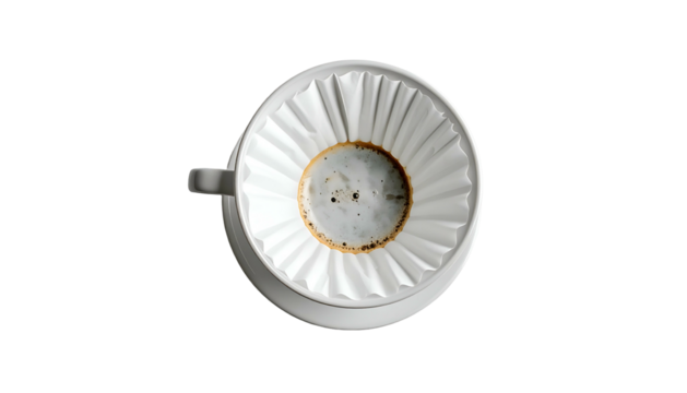 Top-down view White ceramic cup, filter, brewed coffee on black