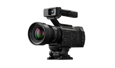 Professional video camera with large lens and attached accessories