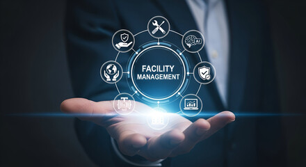 Person holding facility management digital interface hologram