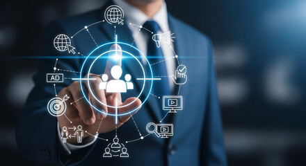Businessman pointing at target audience network on digital interface