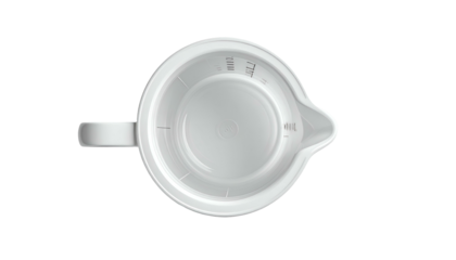 Top-down view of a white measuring cup on a black backdrop