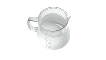 Overhead view clear pitcher filled with water against black void