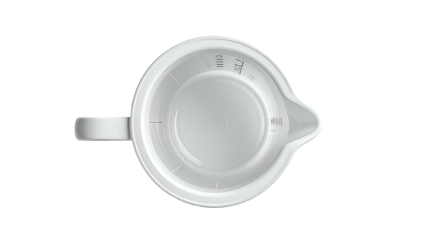 Top-down view of a white measuring cup on a black backdrop