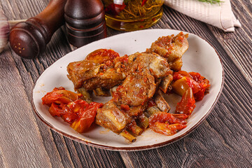 Baked lamb ribs with vegetables