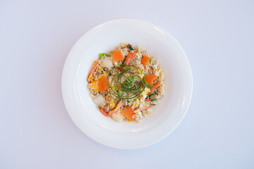 Delicious Fried Rice with Vegetables on a White Plate