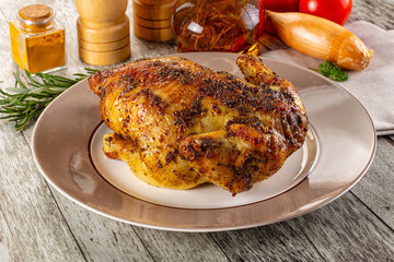 Baked in oven whole chicken with spices