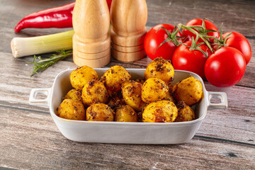 Baked small baby potato with herbs