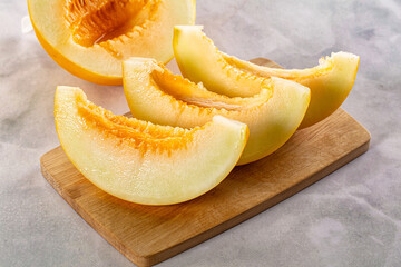 Ripe sweet juicy melon with slices