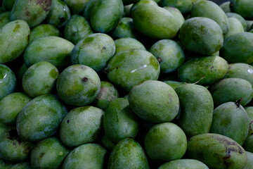 Close-up of Green Mangoes at a Local Fruit Market in Indonesia 