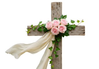 Isolated rustic cross with soft pink roses and flowing ivory cloth for a wedding or memorial