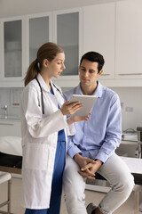 Doctor access to patient records on tablet during consultation