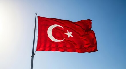 Vibrant Turkish Flag Waving Proudly Against a Clear Blue Sky
