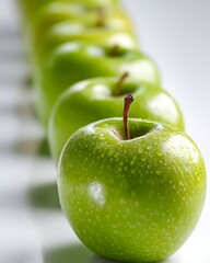 Green Apples in a Row Displaying a Minimalist Arrangement