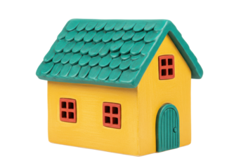 Isolated whimsical ceramic toy house, charming home with green roof and yellow walls, front view