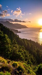 Coastal sunset over forested hills