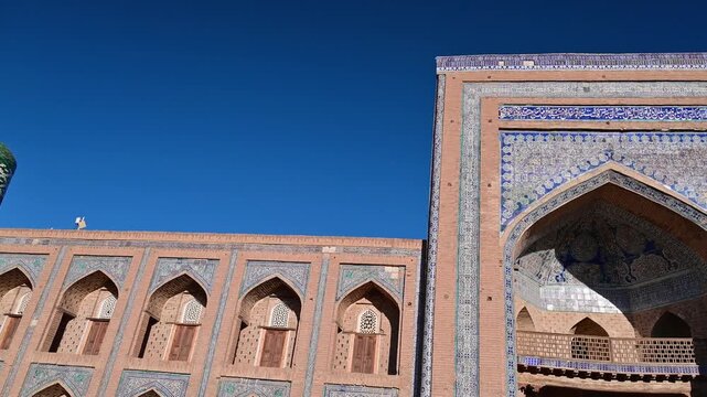Detailed facade of the Muhammad Rahim Khan Madrasah in Khiva, Uzbekistan