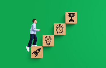 Kid walking up wooden blocks with icons signifying growth, learn