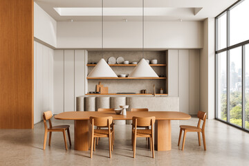 Modern minimalist kitchen and dining interior with wood furniture and large windows showcasing a cityscape background in natural daylight. 3D Rendering