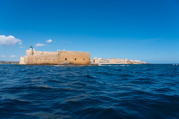 Castello Maniace fortress in Syracuse, Sicily, seen from the Mediterranean Sea