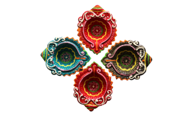 colorful hand painted diwali diyas in decorative arrangement