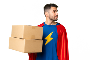 Super Hero delivery caucasian man over isolated chroma key background looking to the side