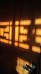 Geometric Window Shadows on Wooden Door