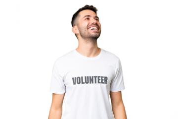 Young volunteer caucasian man over isolated chroma key background laughing
