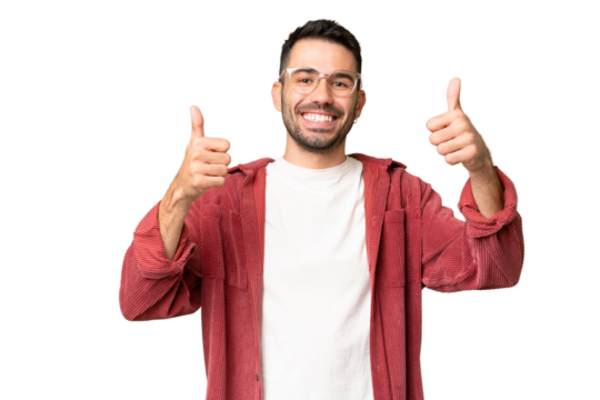 Young handsome caucasian man over isolated chroma key background giving a thumbs up gesture - Powered by Adobe