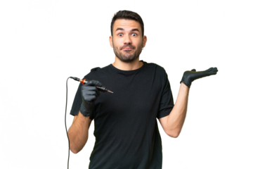 Tattoo artist caucasian man over isolated background having doubts while raising hands