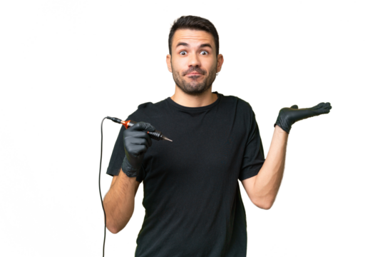 Tattoo artist caucasian man over isolated background having doubts while raising hands