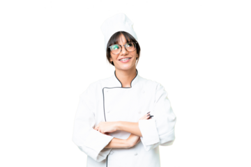 Young caucasian chef  woman over isolated chroma key background looking up while smiling