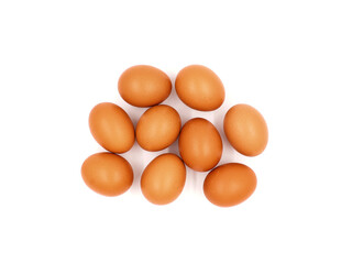 Fresh chicken eggs in top view isolated on a white background.