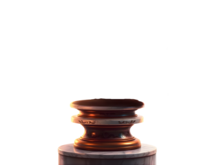 A wooden gavel is isolated on a white background, an old object for a king.