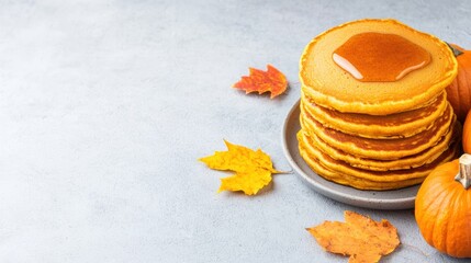 stack of fluffy pancakes drizzled with syrup, surrounded by autumn leaves and pumpkins, creating a cozy seasonal vibe.