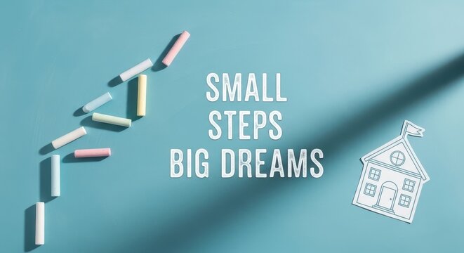 Text Saying Small Steps Big Dreams on a Blue Background