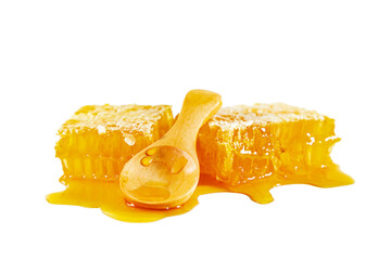 Honeycombs with honey spoon isolated on white background.