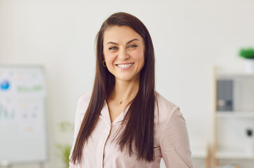 Portrait of a happy businesswoman, accountant or boss working in an office. Positive and professional environment, highlighting role as a chief entrepreneur in the business related work.