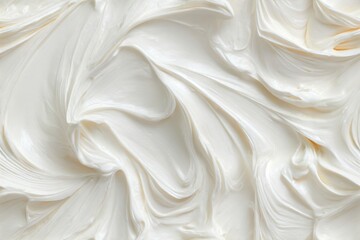 Obraz premium White cream swirl texture background for food, dessert, cosmetic, or abstract design. Seamless pattern for wrapping paper or wallpaper.