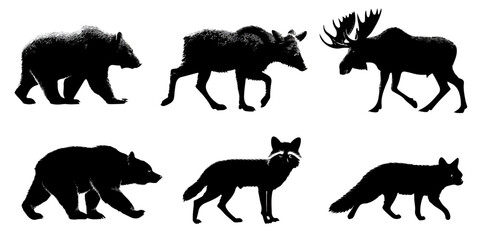 Collection of north American wildlife animal silhouettes including bear wolf moose raccoon beaver and fox silhouette