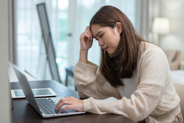 women working on laptop with stressed expression, concept of work pressure, burnout, remote job...