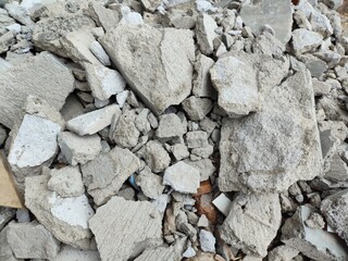 Chunks of stone from the remains of a house.