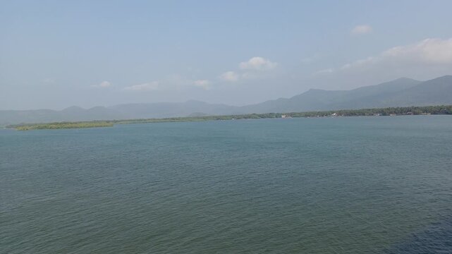 Lake in the mountains, Kali River, which flows through the city of Karwar before it meets the Arabian Sea.