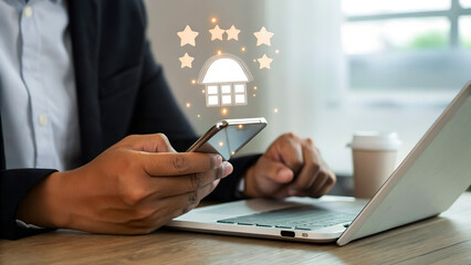 Man checks property rating on smartphone, stars and house icon overlay, modern office desk, business success concept