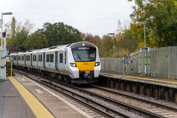 Naklejka premium Modern train at rural station platform