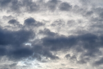 An Overcast Sky Filled with Dramatic and Intricate Cloud Patterns Across the Horizon